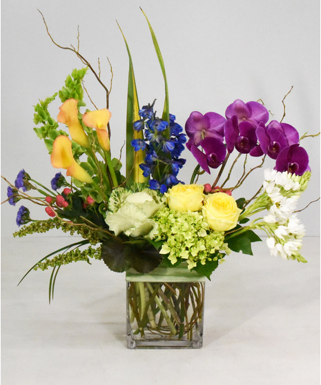 Treat someone to a cheerful palette of floral bliss with a splash of summer color. 