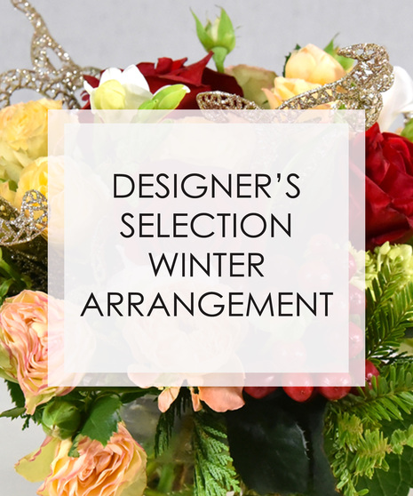 A one of a kind design created by an experienced designer. Your winter bouquet will boast a mix of winter fresh flowers and foliage to create a custom arrangement. 